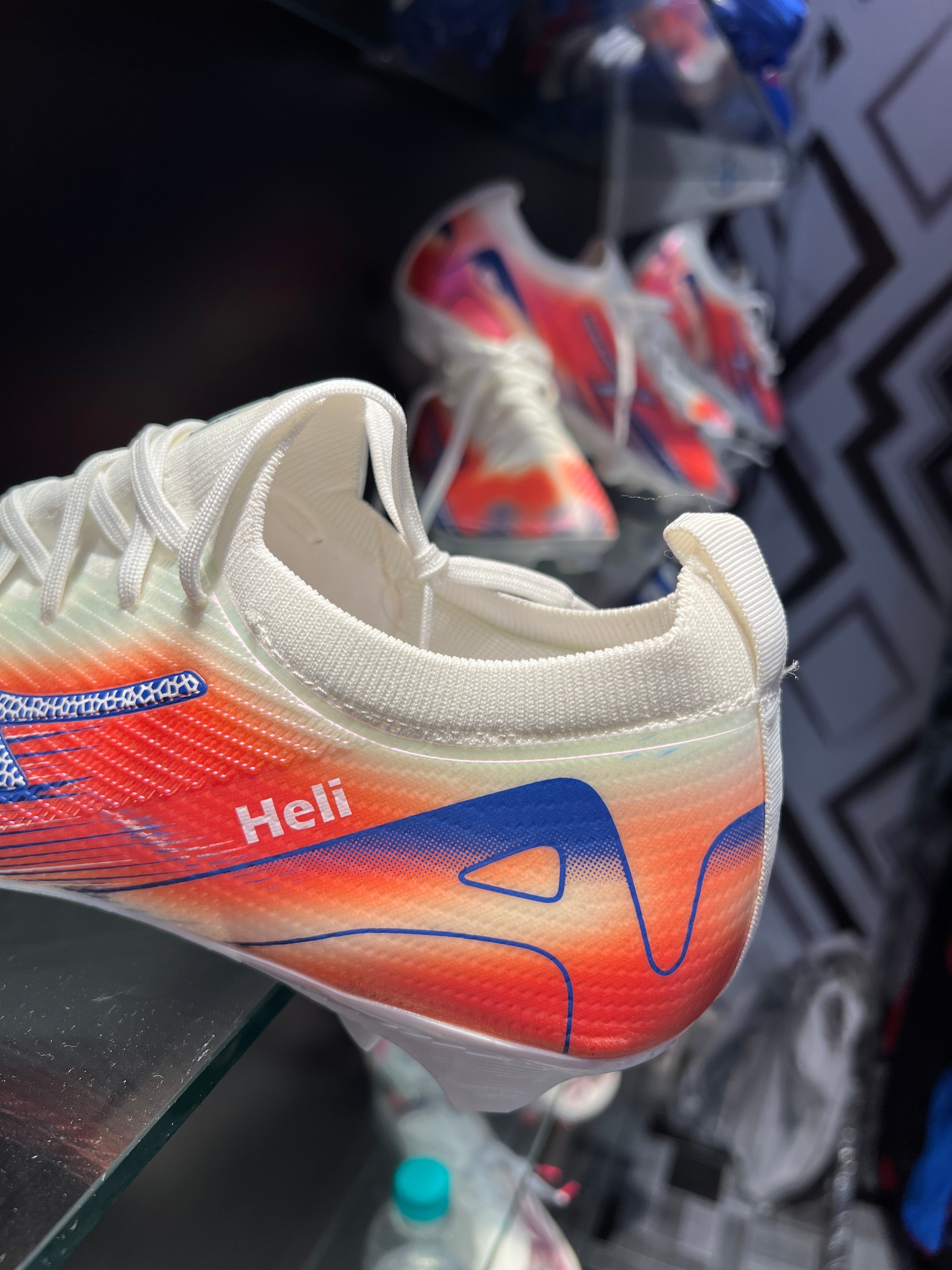 ANZA Lightweight Cleats displayed on turf field