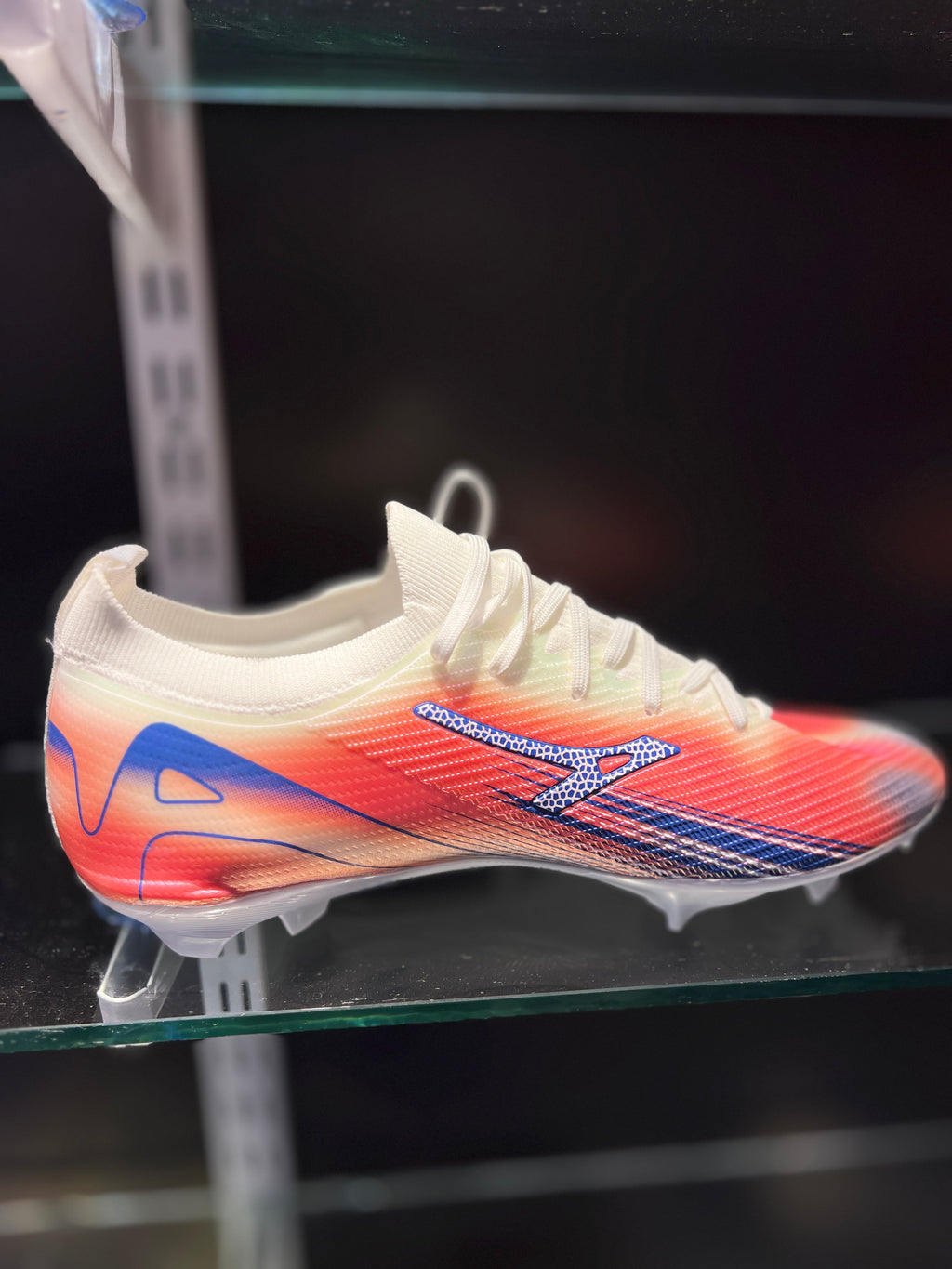 ANZA Speed Series boots close-up of firm ground studs