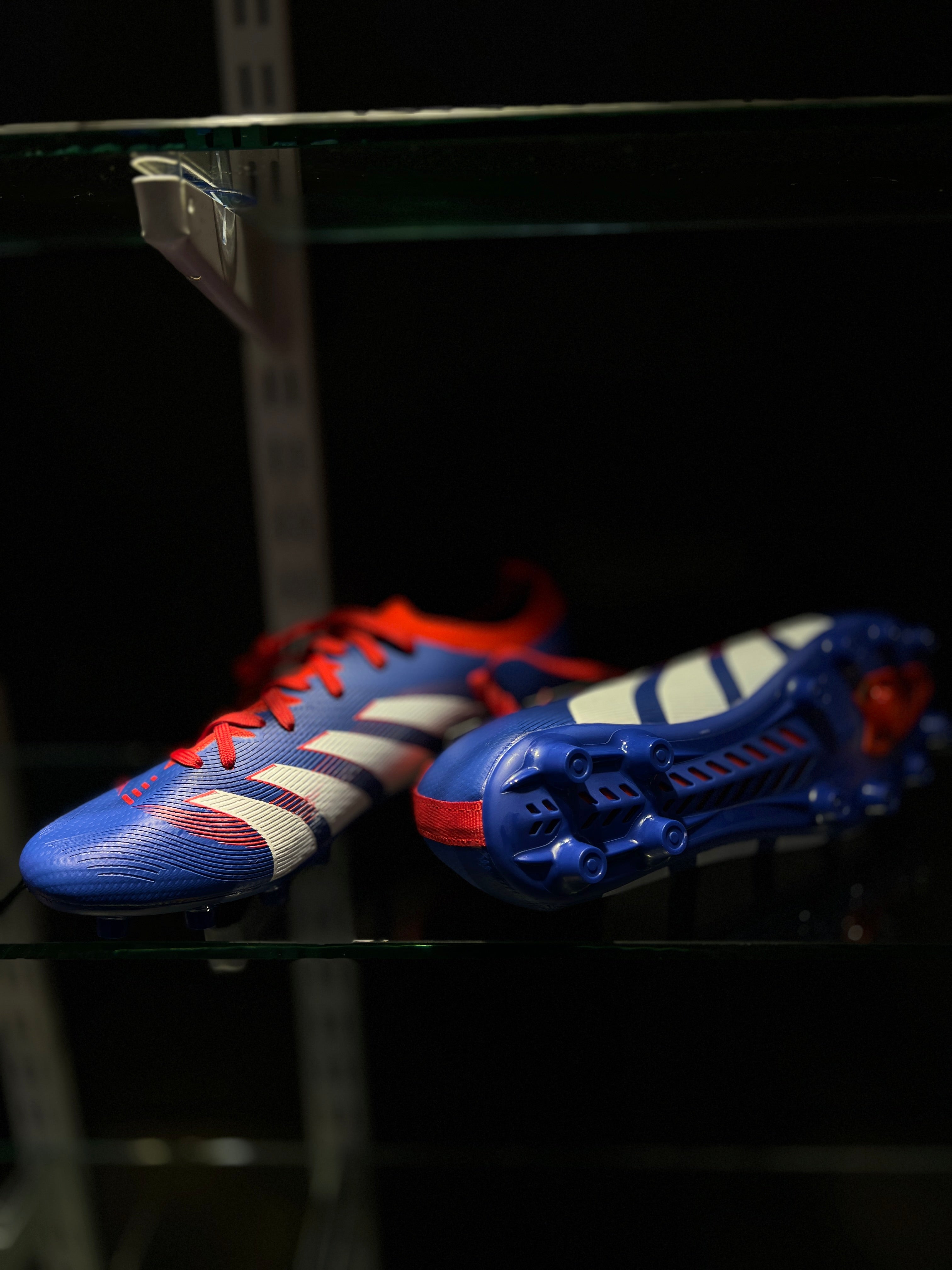 Anza Switch football cleats displayed with sleek sporty design