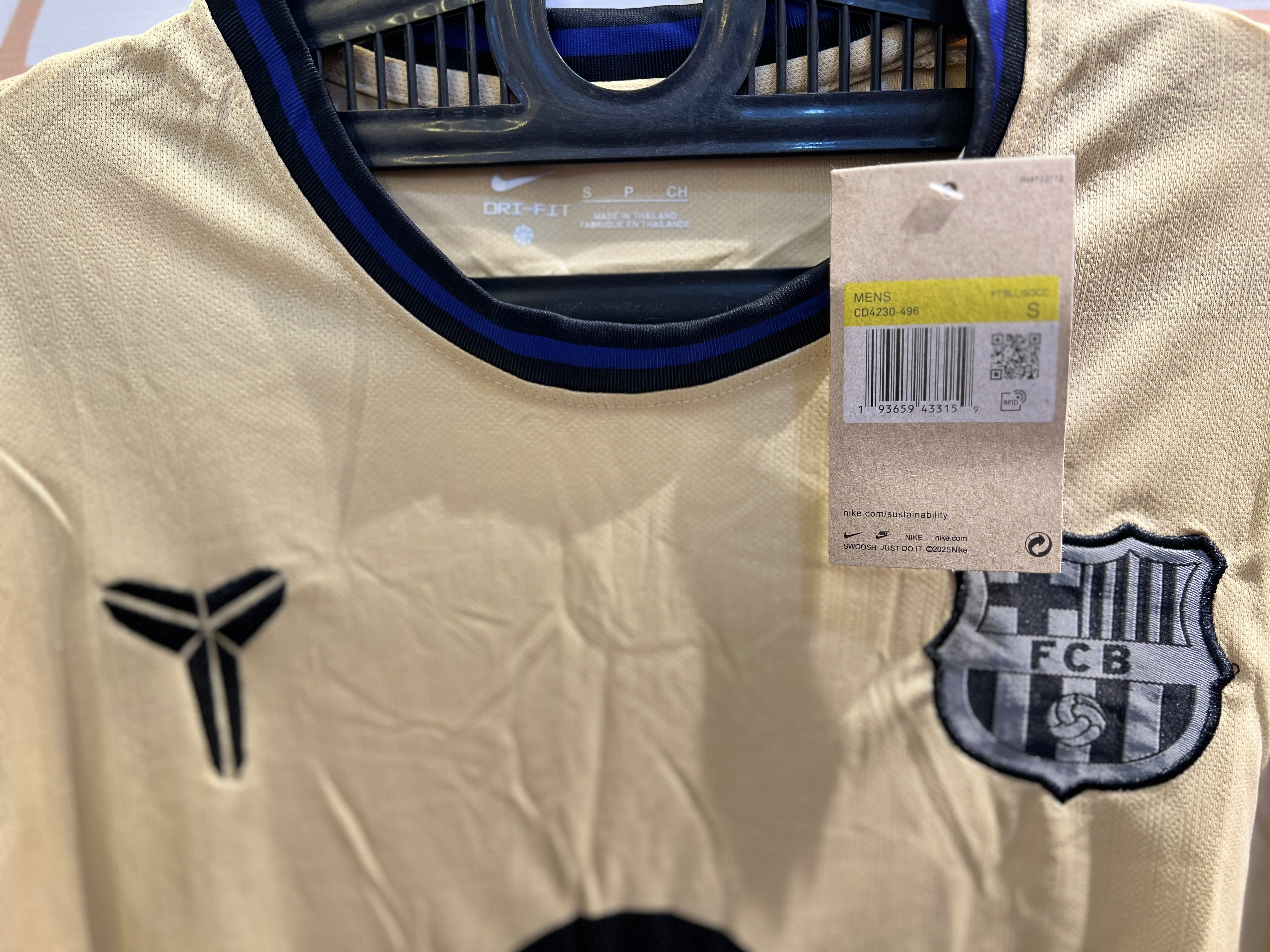 Close-up of FC Barcelona Away 2nd 25/26 Kit fabric texture and club crest detail