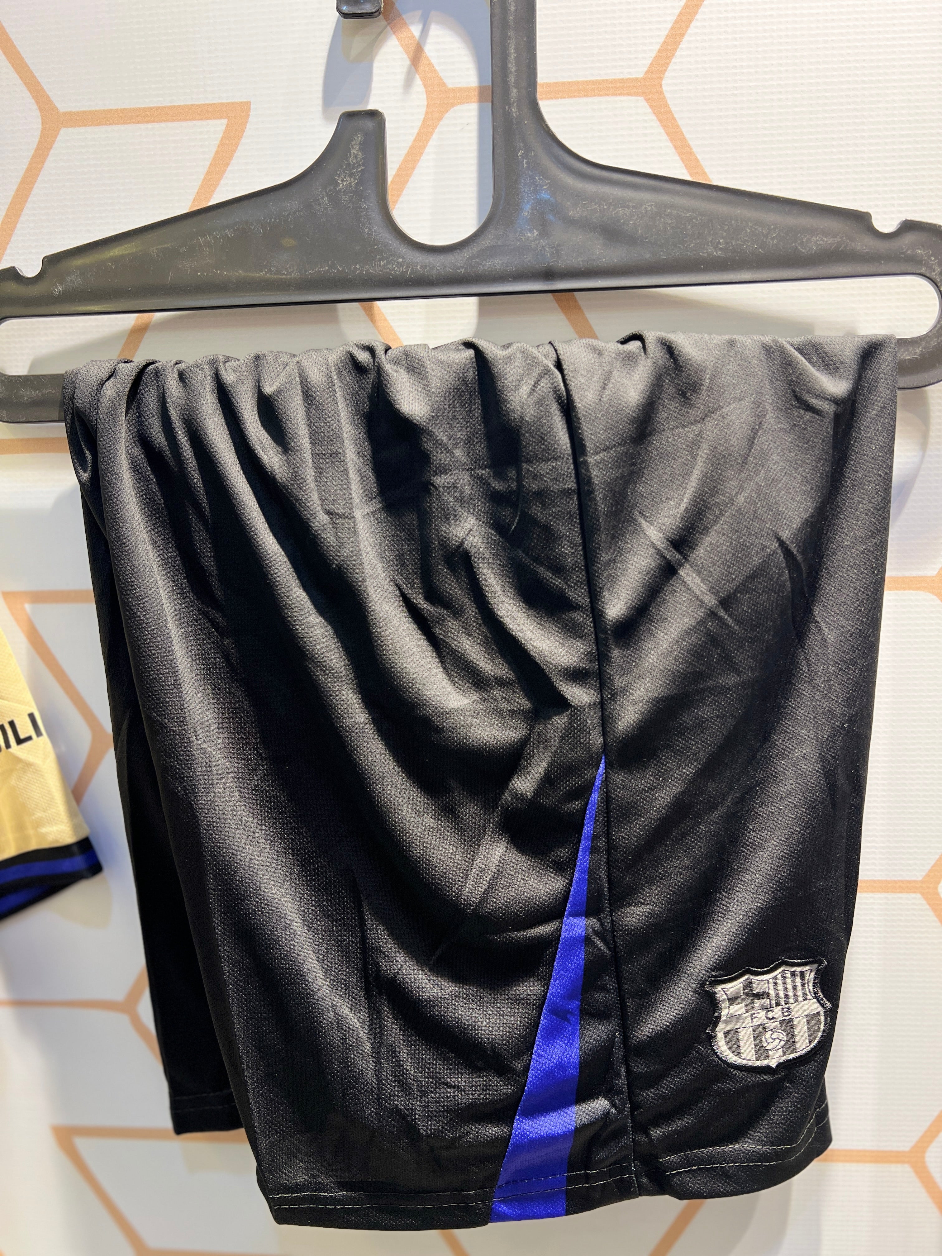 Player wearing FC Barcelona Away 2nd 25/26 Kit during match action