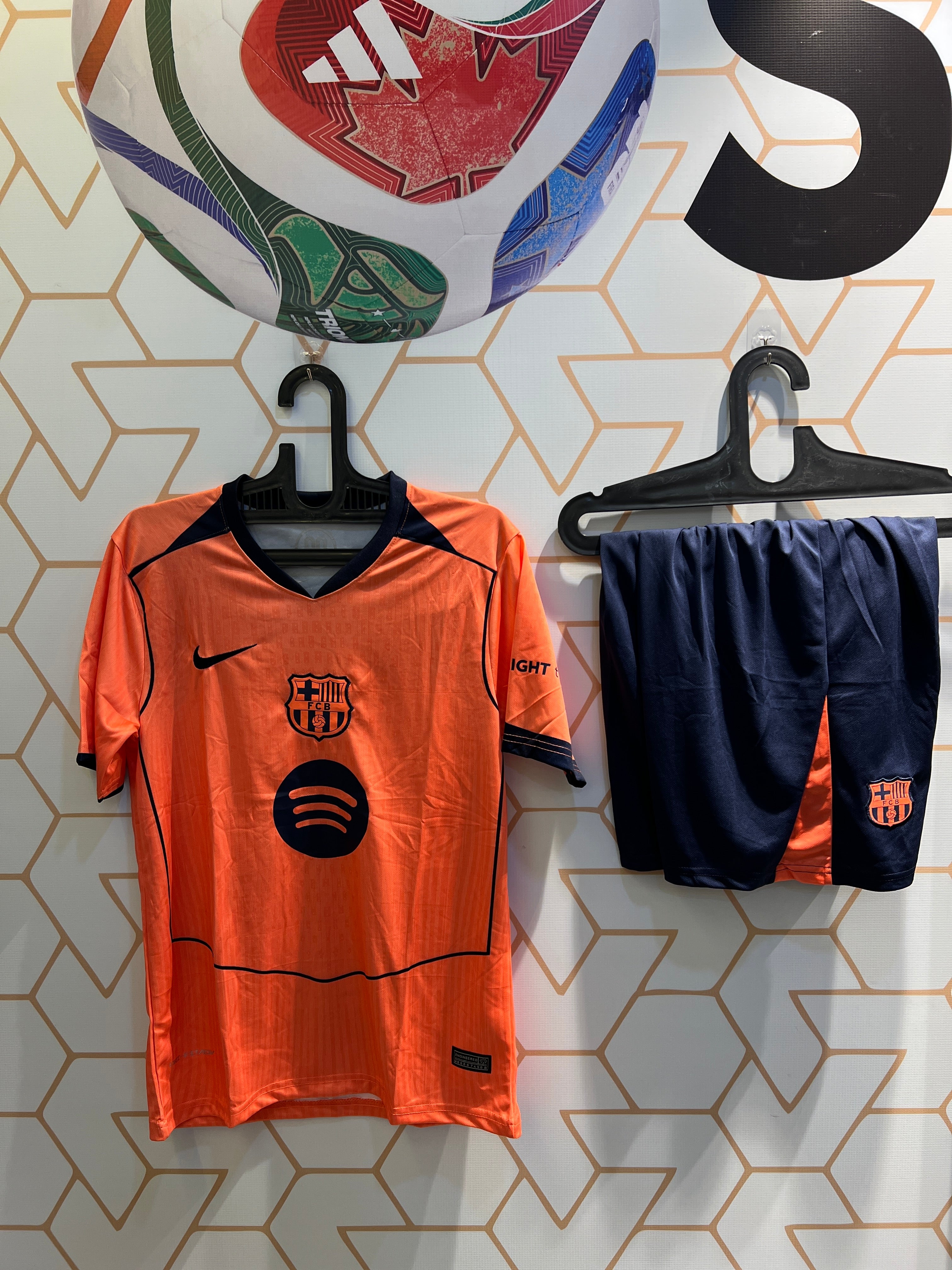 FC Barcelona Away Orange 25/26 Kit front view vibrant orange football jersey and shorts