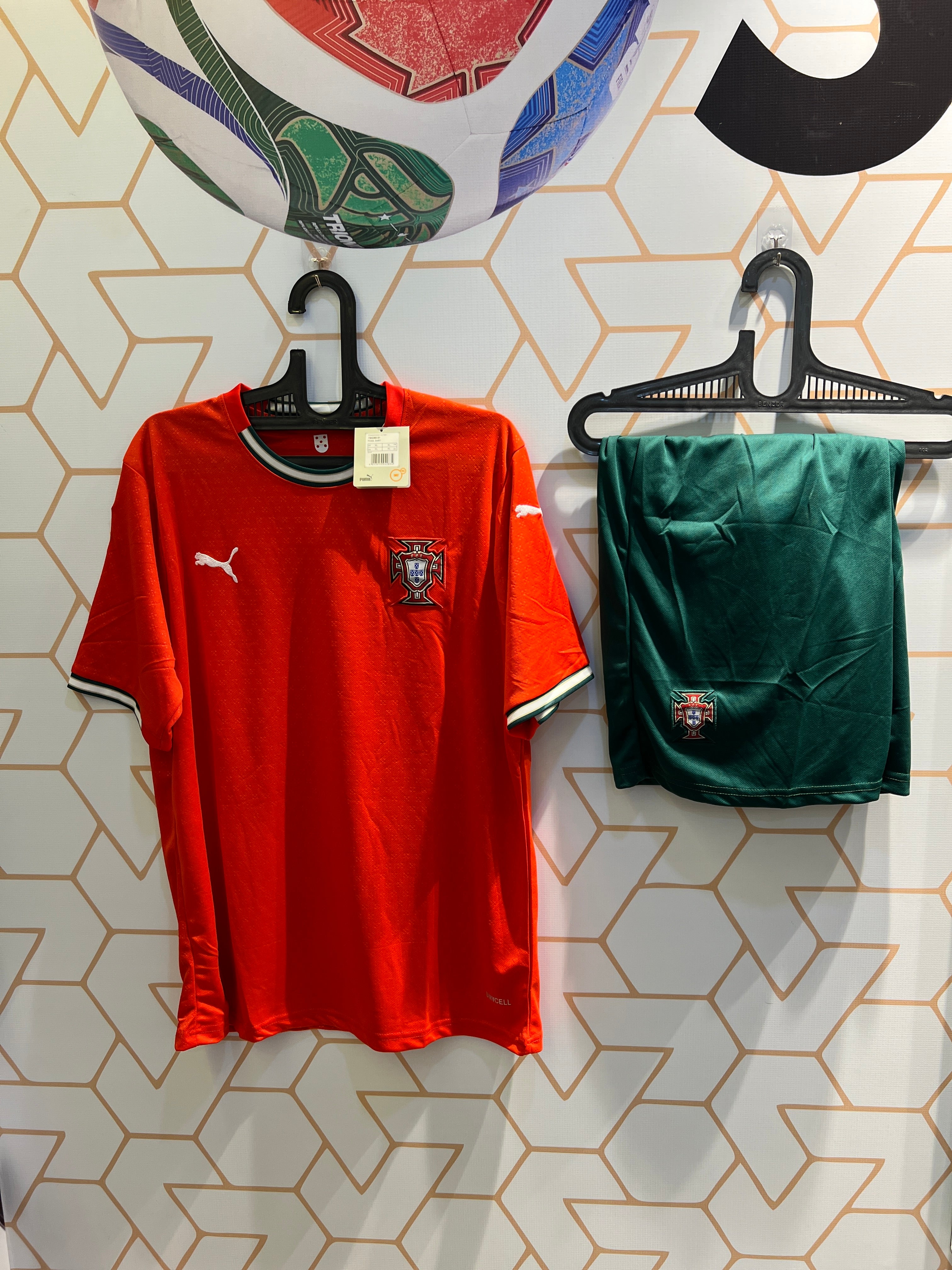 Portugal Home 25/26 football kit front view red jersey and green shorts