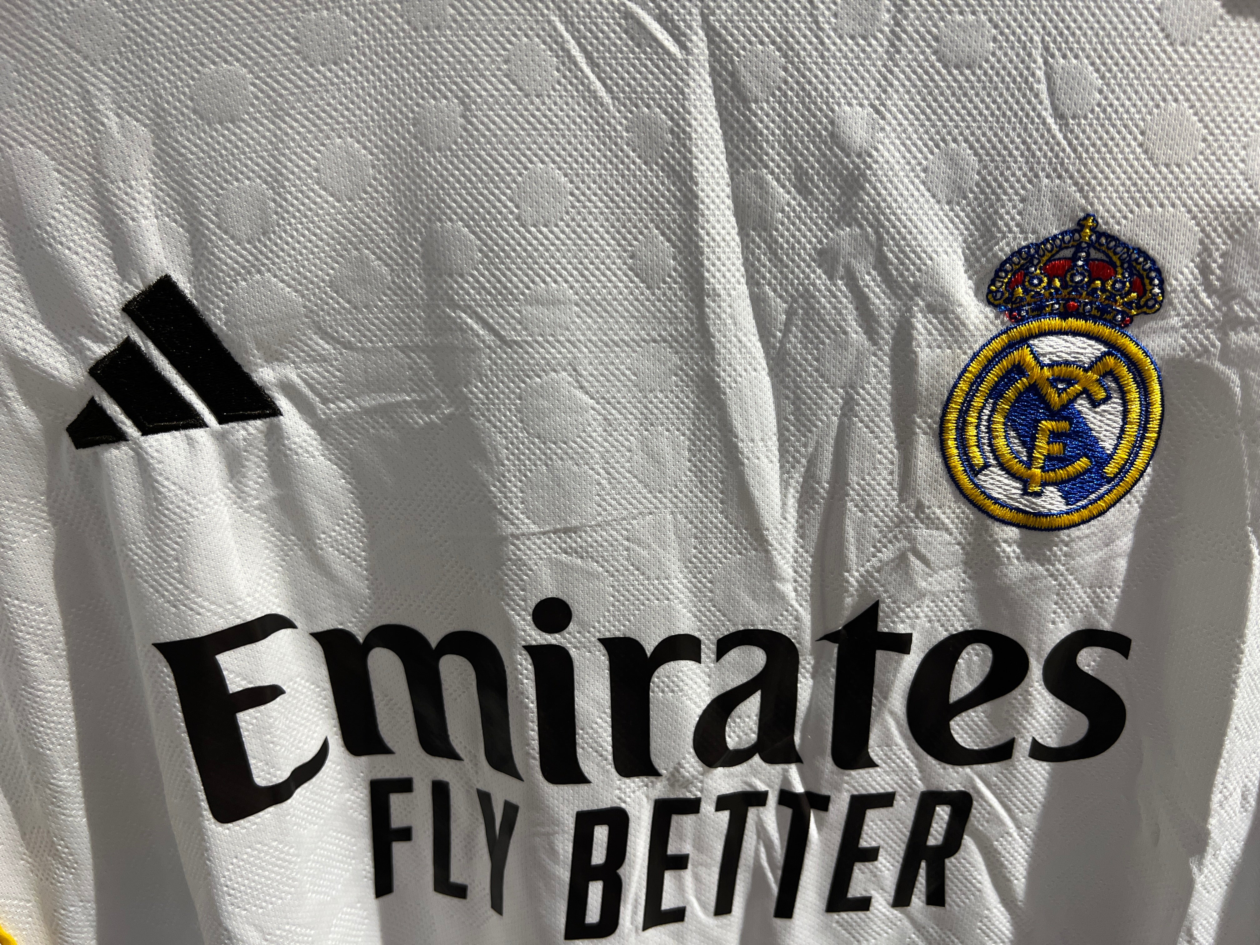 Player wearing Real Madrid Home 25/26 Kit during football match